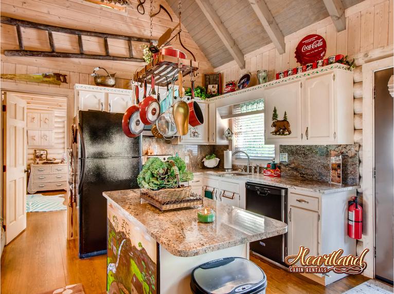 Full kitchen with granite countertops and Keurig Coffee Marker